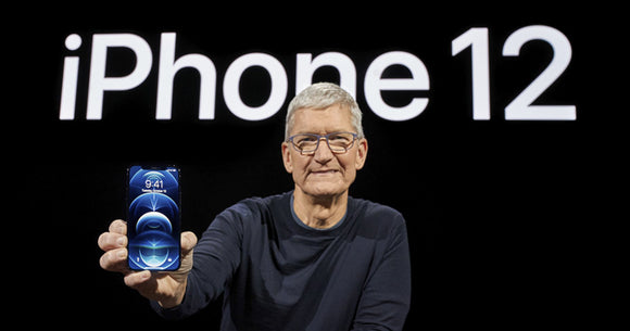 Tim Cook holding the new iPhone 12 at the October Apple event.